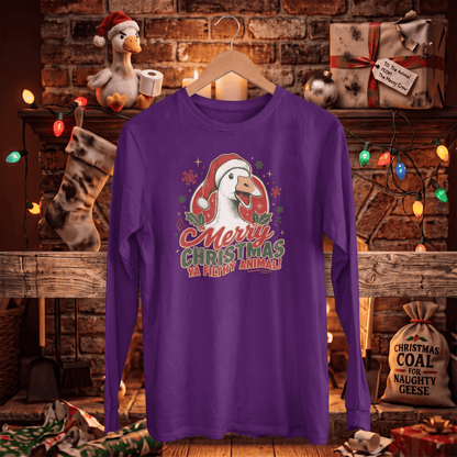A purple long-sleeve t-shirt with a Christmas graphic of a goose wearing a Santa hat and the text 'Merry Christmas Ya Ditty Animal!' displayed on a wooden hanger against a cozy, decorated Christmas fireplace background.